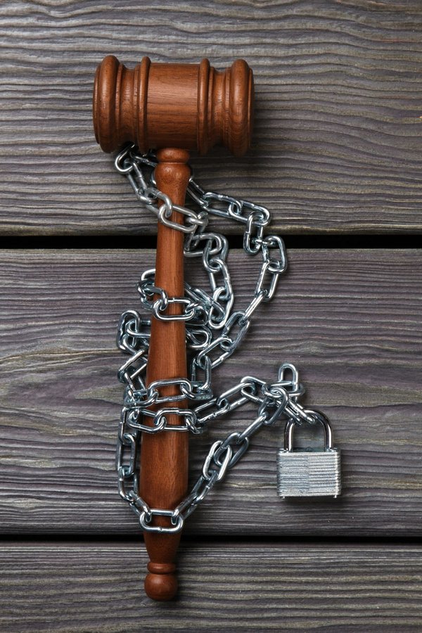 What are the legal requirements for UK businesses when implementing a carbon offsetting program?